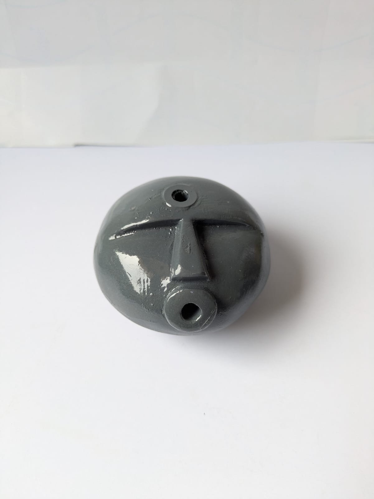 stone face  incense holder