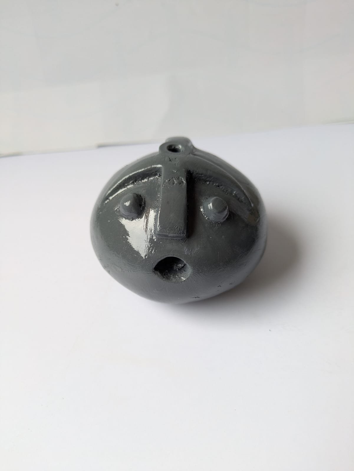stone face  incense holder
